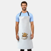 Biscuit in de problemen in een koffiekopje schort (Gedragen)