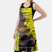 Black abstract splatter paint drips on a bright ye schort (Insitu)