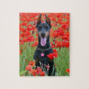 Black and Tan Doberman Pinscher in Red Flowers Legpuzzel