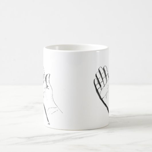 black and white hand on coffee mug koffiemok (Center)