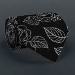Black And White Leafy NeckTie Stropdas<br><div class="desc">Elevate your evening attire with this striking black necktie, featuring a crisp white floral and leaf motif. The high-contrast botanical print offers a fresh, modern take on traditional floral patterns, making it a versatile piece for weddings, galas, or high-stakes boardroom meetings.</div>