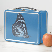 Black butterfly with blue spots, metal lunch boxes (In situ)