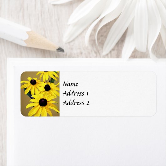 Black-Eyed Susans in een rij Etiket (Insitu)