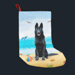 Black German Shepherd Dog on Beach Kleine Kerstsok<br><div class="desc">Zwarte Duitse herderhond die op het strand zit is een perfect cadeauidee voor iemand die van dit hondenras houdt.</div>