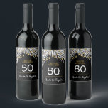 Black Gold 50th Birthday Wijn Etiket<br><div class="desc">Etiketten op creëer gepersonaliseerde wijnflessen die zijn voorzien van jouw naam en leeftijd waarop witte palmvloeren en lichtjes op een zwarte achtergrond worden aangebracht - VERANDEREN de ACHTERGROND COLOR naar alles. Alle tekst-,  lettertypen- en lettertypekleuren kunnen worden gewijzigd. Bekijk objecten in onze winkel.</div>