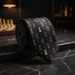 Black Gold Chess Stropdas<br><div class="desc">Make a bold, intellectual statement with this luxurious black necktie adorned with a stunning arrangement of golden chess pieces! Intricately detailed illustrations of kings, queens, bishops, knights, rooks, and pawns are beautifully scattered across a rich, deep black background in shimmering metallic gold tones, creating a sophisticated, high-contrast pattern that exudes...</div>