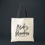 Black Hand Lettering Bride's Grandma Personalized Tote Bag<br><div class="desc">bride's oma canvas tas. Moderne en klassieke canvas tas met een zwart handschrift van de oma van de bruid. Personaliseer door de naam van de ontvanger, de hashtag van de bruiloft of andere details toe te voegen. Perfect als cadeau voor je bruiloft of bruidfeest.</div>