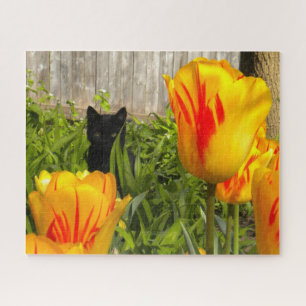 Black Kitten in de kleurrijke Tulp Garden Legpuzzel