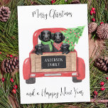 Black Labrador Dogs Red Truck Merry Kerstmis Feestdagenkaart<br><div class="desc">Stuur kerstfeestdagen dit vakantieseizoen met deze zwarte labrador rekende honden in een waterverf ontwerp. Deze zwarte labrador vakantiekaart is voorzien van vier labrador pups in een waterverf rode kersttruck met vakantieboom. Personaliseer met groet voorzijde en berichtrug.. Deze zwarte kerstkaart zal een favoriet zijn onder zwarte labrador liefhebbers, hondenliefhebbers en dierenvrienden....</div>