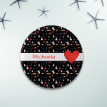 Black Medical Equipment Pattern Red Heart Ronde Button 5,7 Cm<br><div class="desc">Cute personalize black button with a background of a medical equipment. From adhesive bandages, pills, bottles to blue stethoscopes. In the middle front there is a wide white line with the red text that you can personalize. On the right side of the text, there is an illustrated red heart. Customize...</div>