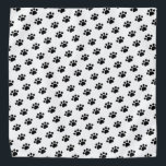 Black Paw Print Pattern Bandana<br><div class="desc">Introductie van ons charmante patroon van zwarte pootafdrukken op een schone witte achtergrond, een ontwerp dat de essentie van uw liefde voor huisdieren vastlegt. Dit prachtige patroon heeft een reeks zwarte pootafdrukken die in een herhaald patroon zijn gerangschikt, waardoor een speels en opvallend effect ontstaat. Of je nu een trotse...</div>