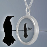 Black Raven Silhouette met Initialen Zilver Vergulden Ketting<br><div class="desc">Een solitaire Raven op een draadje in zwart silhouet tegen een grijze lucht op dit gotische hanger ketting. Door de geschiedenis en de wereldculturen heen is de raaf te vinden in overlevering, mythologie en literatuur. De symboliek van de raaf is gevarieerd. Het is geweldig voor vogelliefhebbers en fans van Edgar...</div>