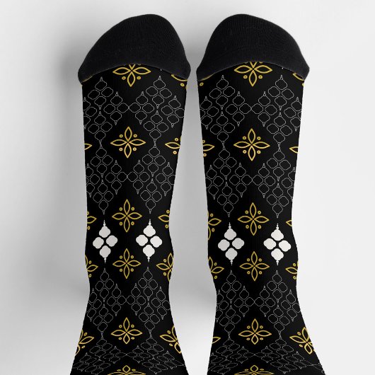 Black socks featuring a gold and white pattern  sokken