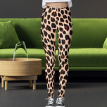 Black Tan White Safari Leopard Skin Pattern Print Leggings<br><div class="desc">Elevate your workouts with these leopard print leggings, featuring bold black and brown spots on a tan and white base. Made from soft, stretchy fabric, it is perfect for yoga, gym sessions, running, or casual wear. Personalize it (optional) by adding your own image for a unique touch. Unleash your wild...</div>