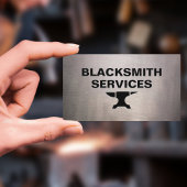 Blacksmith - aambeeld op versleten plaatwerk visitekaartje