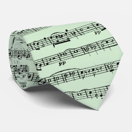 Blad muziekontwerp op groen stropdas