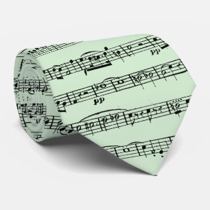 Blad muziekontwerp op groen stropdas