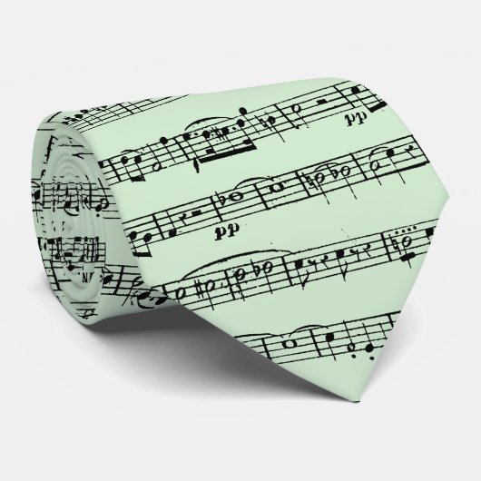 Blad muziekontwerp op groen stropdas (Opgerold)