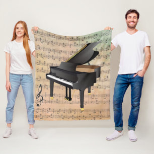  blademuziek met een piano fleece deken
