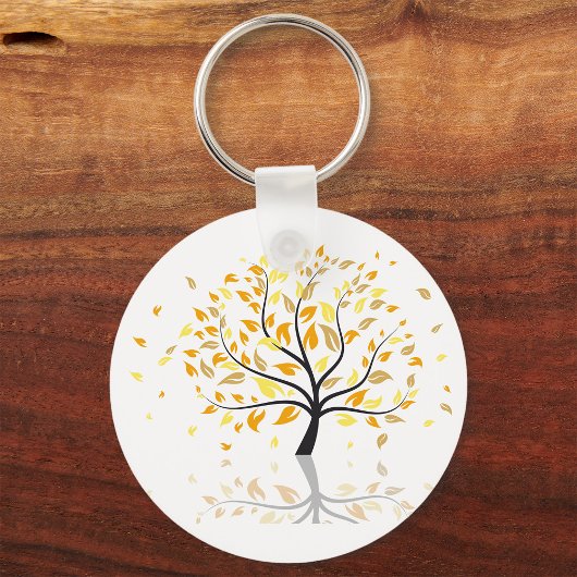 Bladeren die uit een boom vallen sleutelhanger