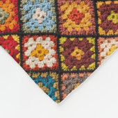 Bladeren door geanimeerde vierkantjes van Granny Fleece Deken (Hoek)