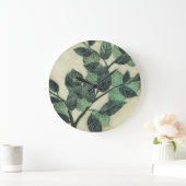 Bladeren en vertakkingen op de achtergrond van Cre Grote Klok (Huis)