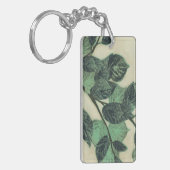 Bladeren en vertakkingen op de achtergrond van Cre Sleutelhanger (Voorkant Links)