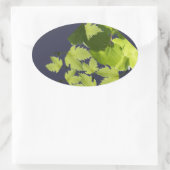 Bladeren met druivenwijn ovale sticker (Tas)