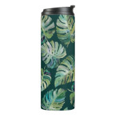 Bladeren van exotische tropische plant monstera. N Thermosbeker (Gedraaid links)