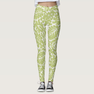 Bladerpatroon met groene leggings