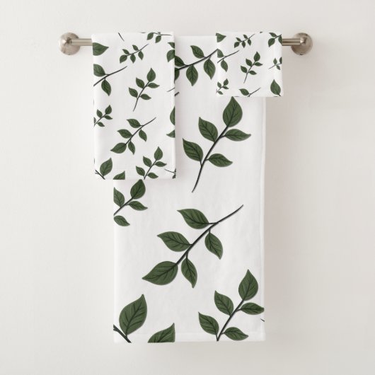 Bladertakken met groene bladeren op wit bad handdoek (Insitu)
