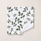 Bladertakken met groene bladeren op wit bad handdoek (Wasdoekje)