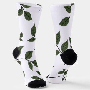 Bladertakken met groene bladeren op wit sokken