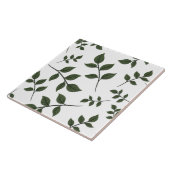 Bladertakken met groene bladeren op wit tegeltje (Zijkant)