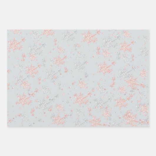 Blanzend roze goud en zilversneeuwvlokken van grij inpakpapier vel (Voorkant)
