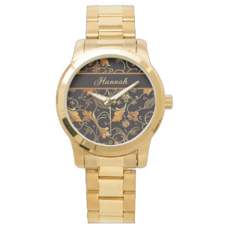 Blätter und Ranken orange auf schwarz Muster Horloge