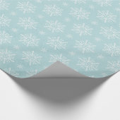 blauw cadeautje met kerstsnowschilfers cadeaupapier (Hoek)