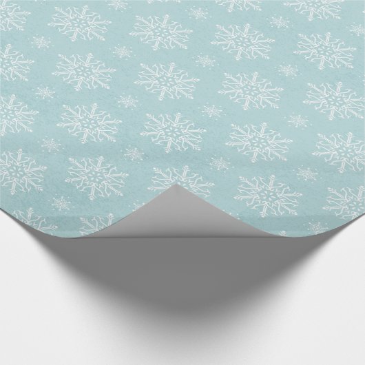 blauw cadeautje met kerstsnowschilfers cadeaupapier (Hoek)