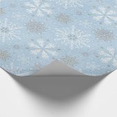  blauw cadeautje met witte kerstsnowschilfers cadeaupapier (Hoek)