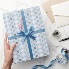 blauw cadeautje met witte kerstsnowschilfers cadeaupapier