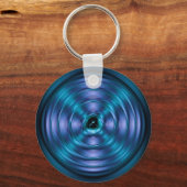 Blauw draaiend atoom sleutelhanger (Voorkant)