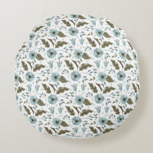 Blauw en groen bloemmotief rond kussen