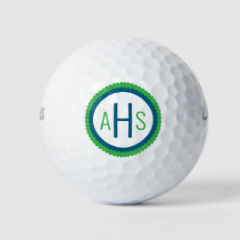 Blauw en groen geschulpte drielettermonogram golfballen