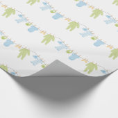 Blauw- en groenkleding voor het oppakken van papie cadeaupapier (Hoek)