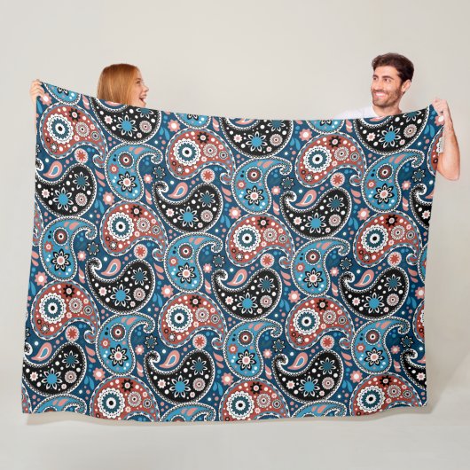 Blauw en rood traditioneel printpatroon fleece deken (In situ)