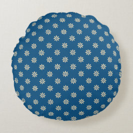 Blauw en wit bloemmotief rond kussen