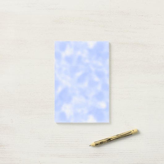 Blauw en wit gebotteld post-it® notes (Op bureau)