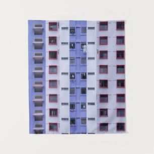 Blauw en wit hoogstijgend gebouw wandkleed
