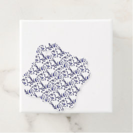 Blauw en wit inpakpapier met een afbeelding bedankjes labels