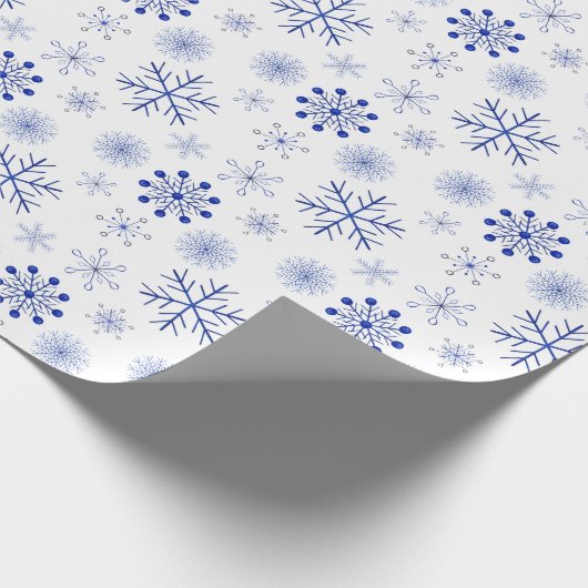 Blauw en wit kerstcadeaupapier voor kerstcadeaus cadeaupapier (Hoek)